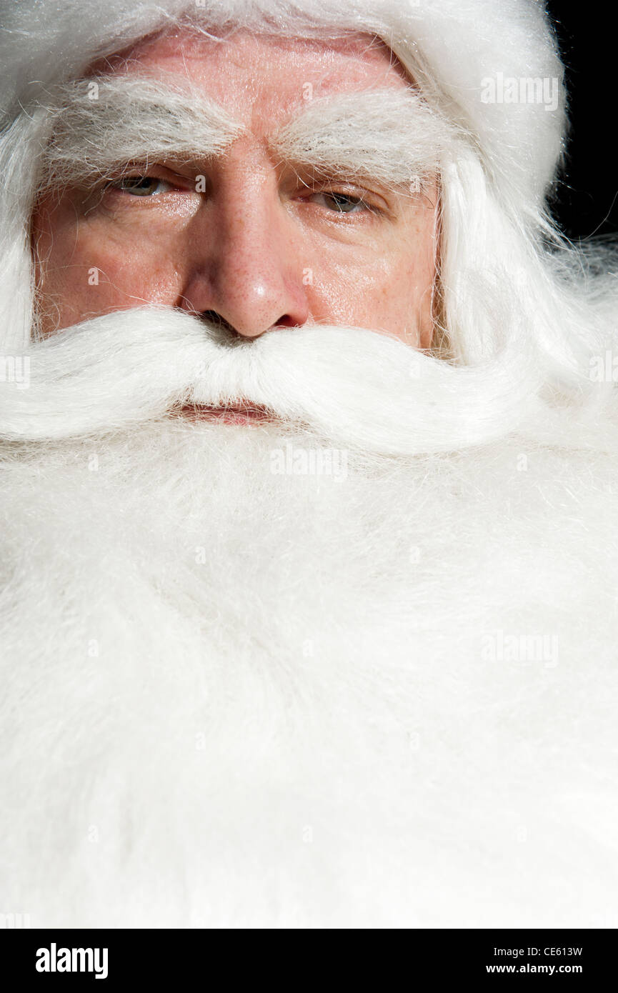 Santa Claus Portrait smiling isolated over a black background Stock ...
