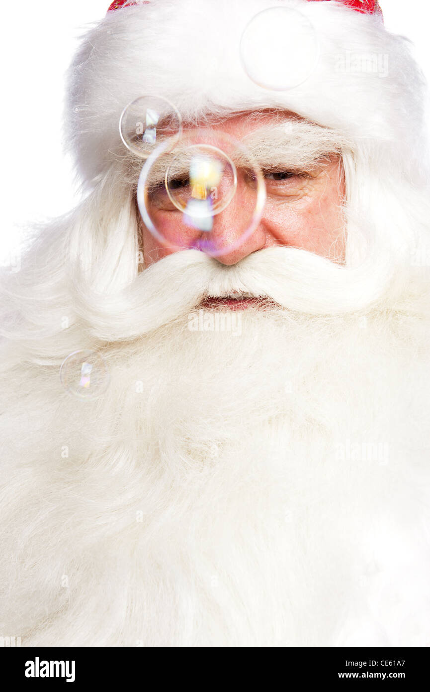 Santa Claus Portrait smiling isolated over a white background and soap ...