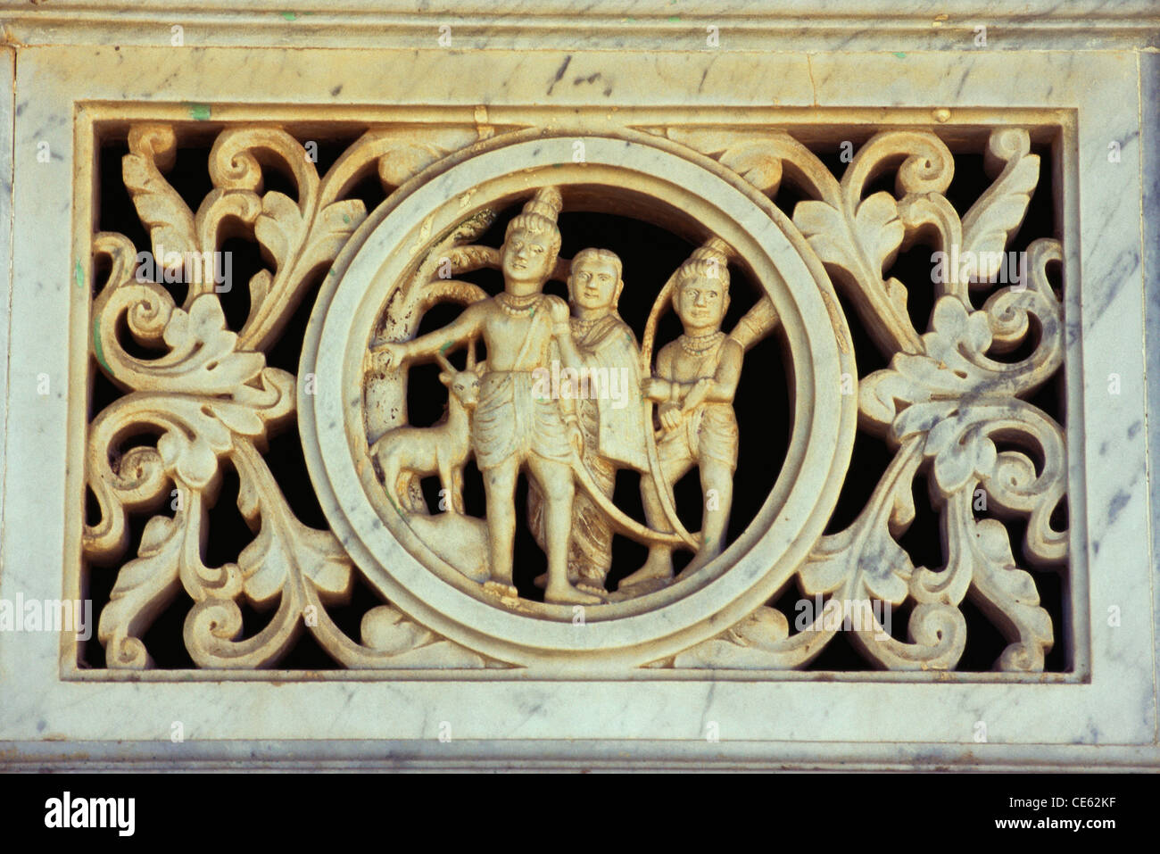 Ram Laxman and Sita richly carved on marble jali window Sayla Gujarat India Stock Photo