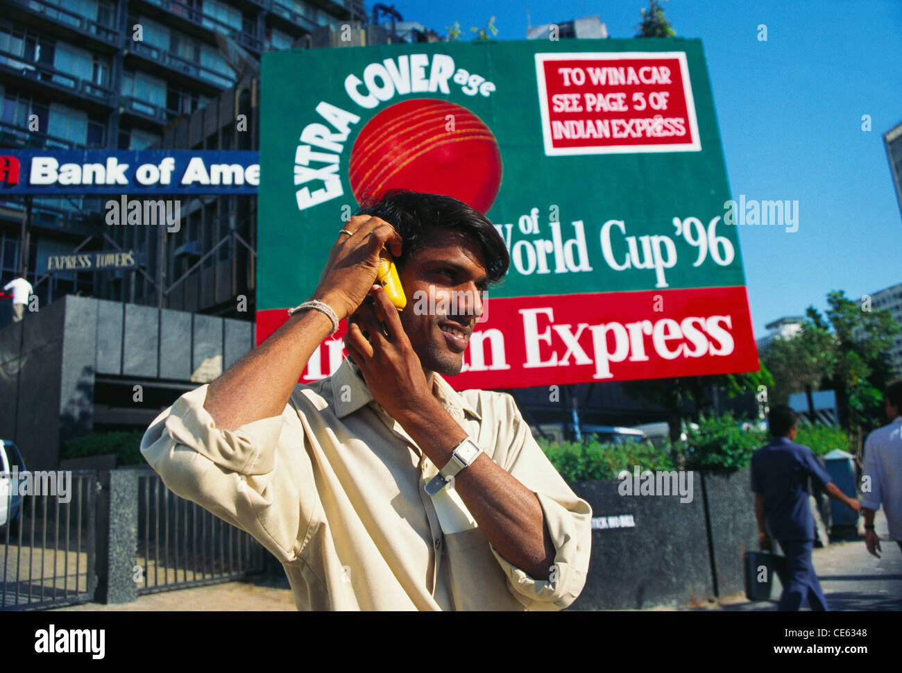 Man listening to cricket commentary on radio India Stock Photo