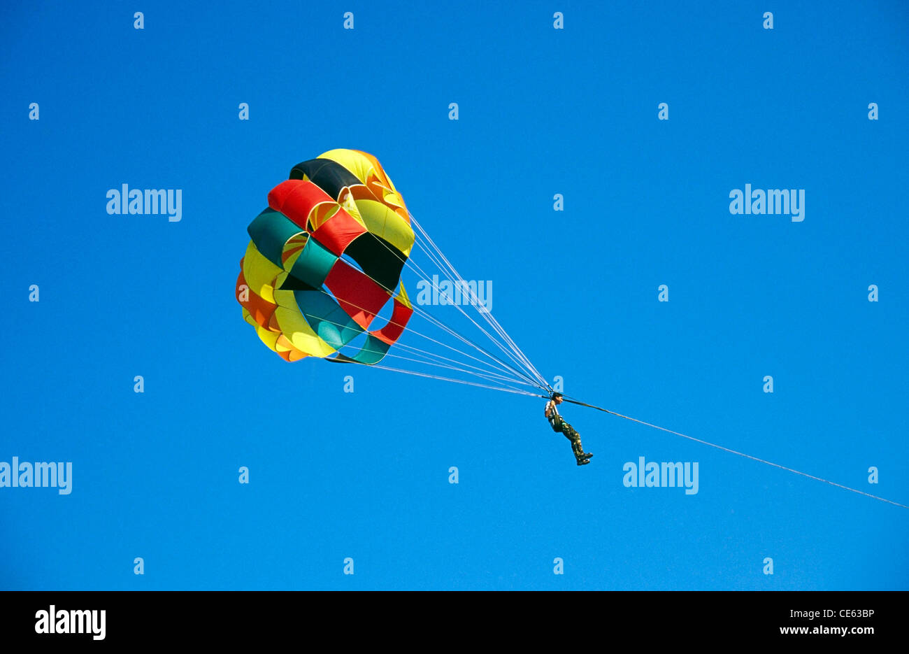 Parasailing with colorful parachute ; India ; Asia Stock Photo Alamy