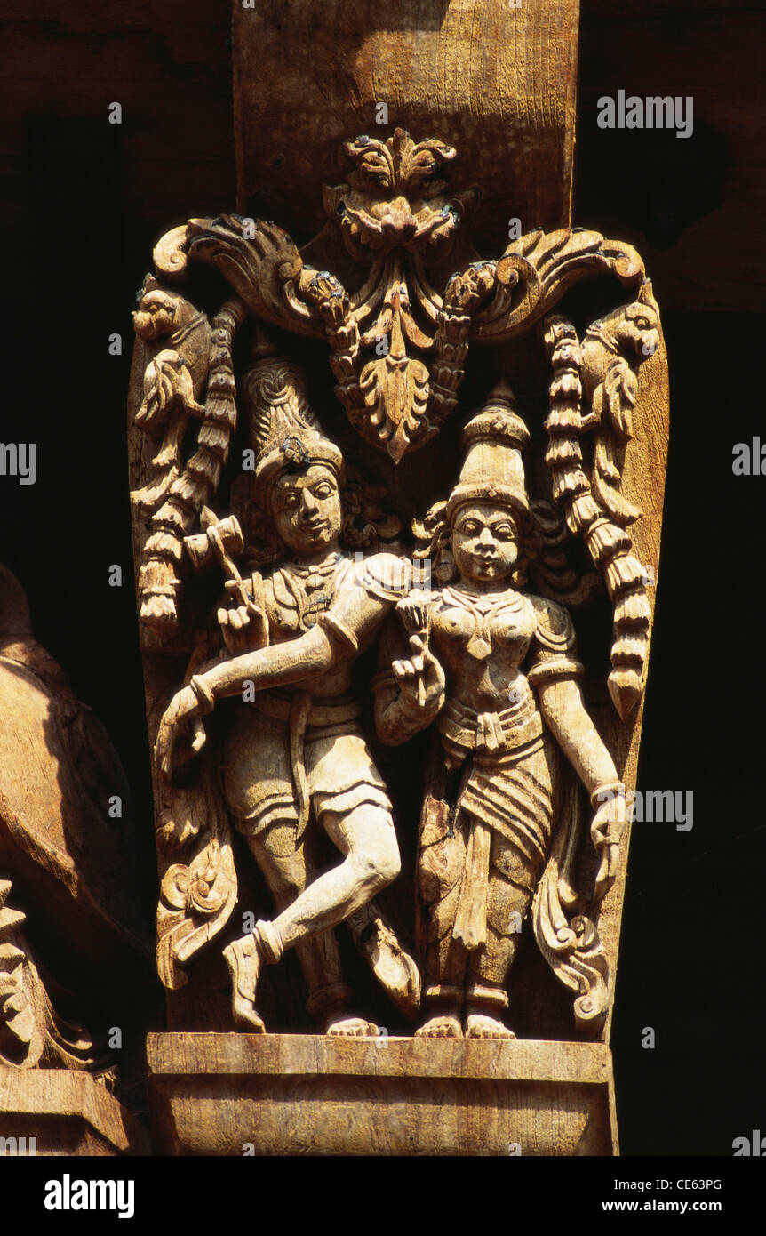 shiv parvati wood carving sculpture in temple chariot at Madurai ; Tamil Nadu ; India Stock Photo