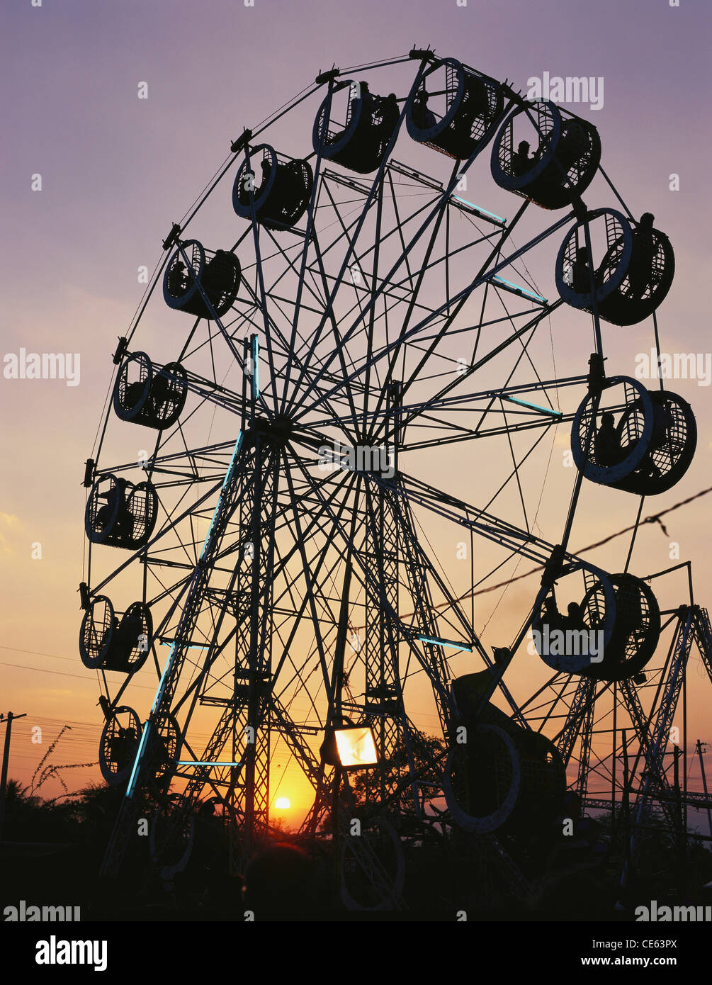 Ferris wheel amusement ride ; Giant wheel ; silhouette ; India ; asia Stock Photo