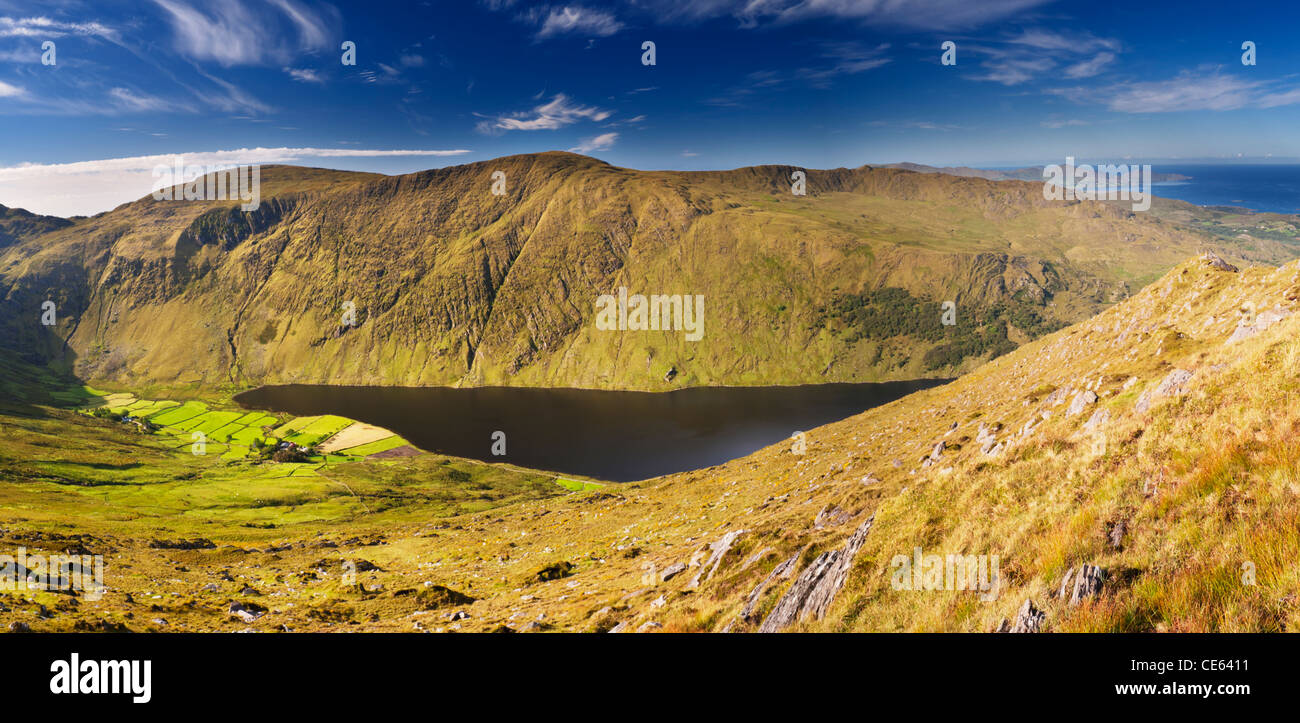 View over Glenbeg Lough from Tooreennamna Mountain, near Ardgroom, Beara, County Cork, Ireland Stock Photo