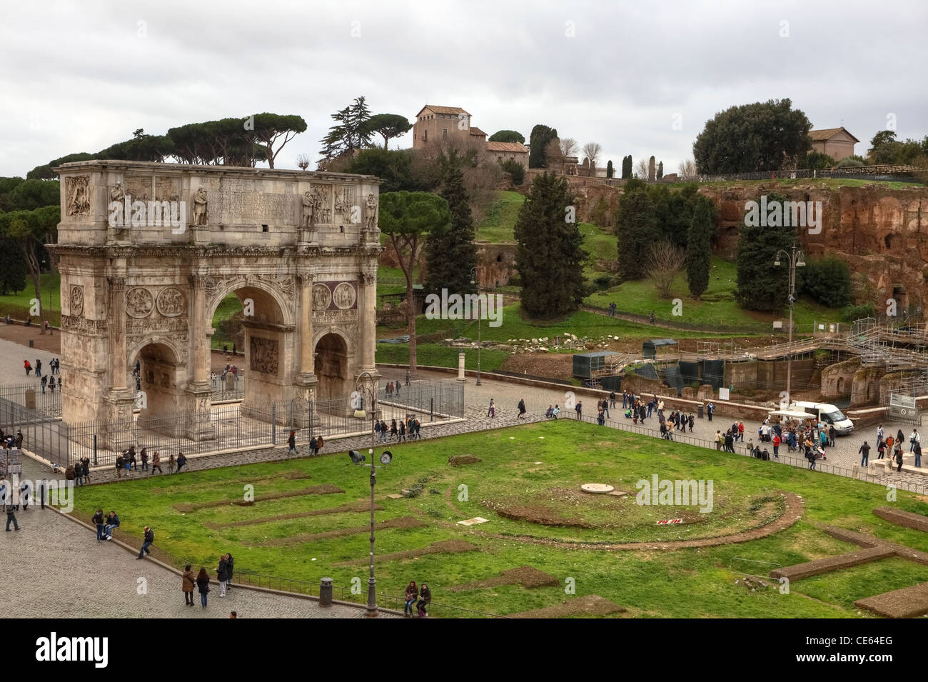 The Arch of Constantine is a threedoors arch next to the Colosseum in