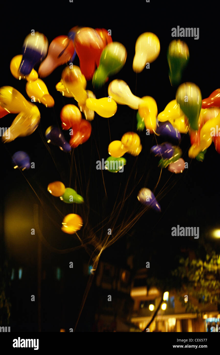 Balloons released floating up in the air ; india ; asia Stock Photo - Alamy