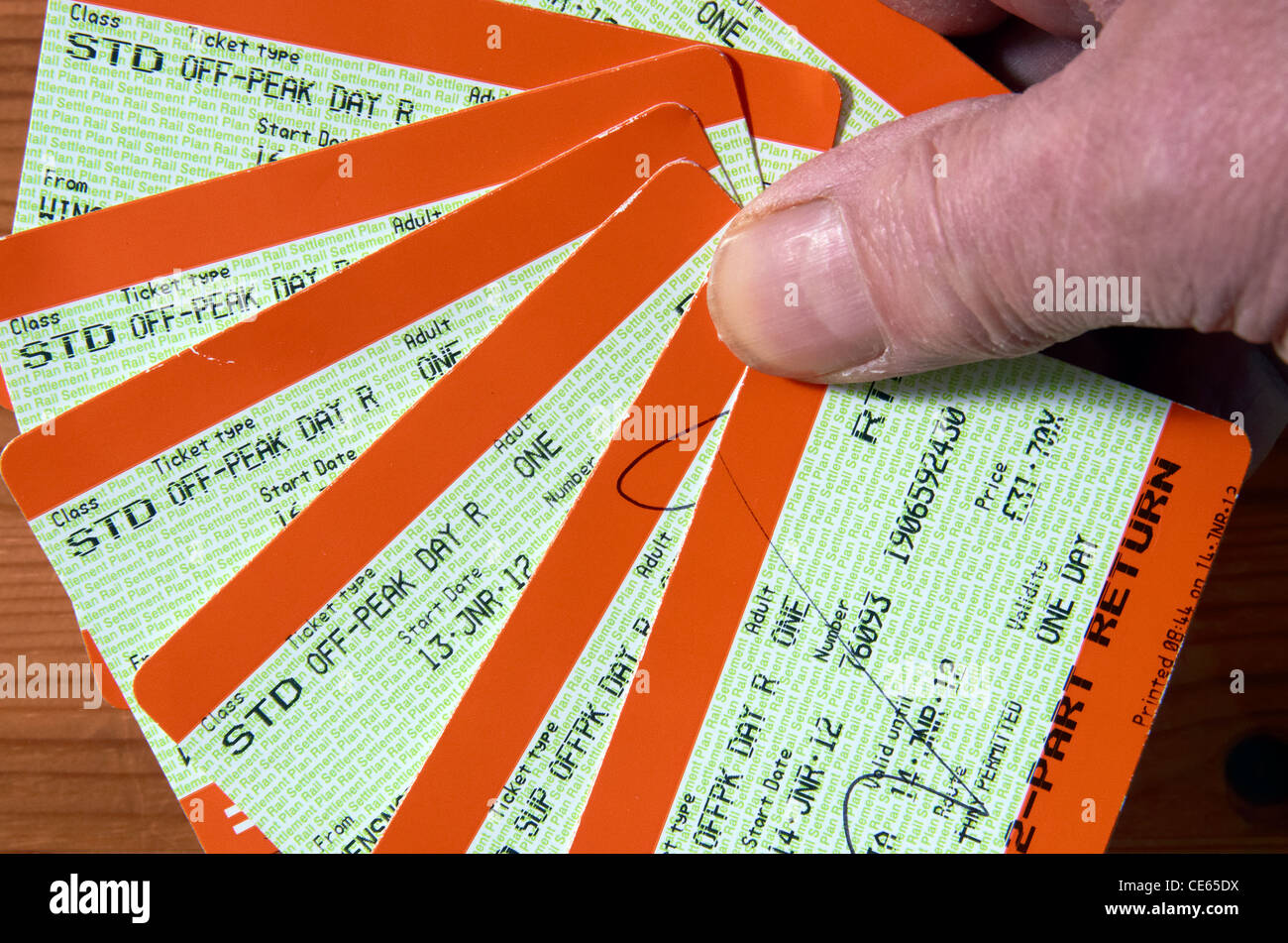 Train tickets held in a hand Stock Photo