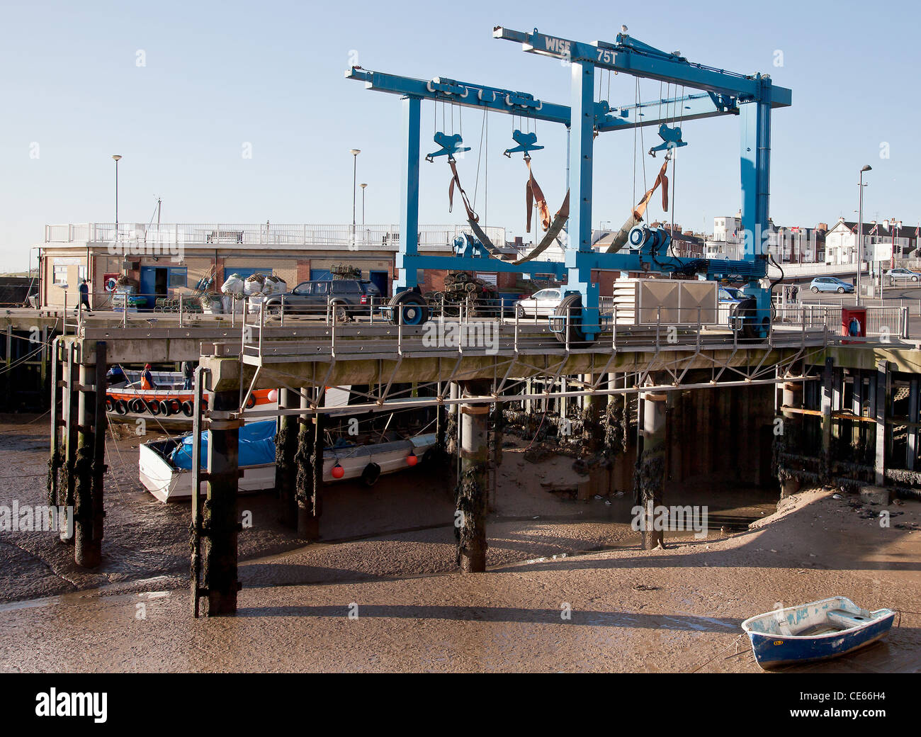 Boat lifting equipment into dry Dock Stock Photo Alamy