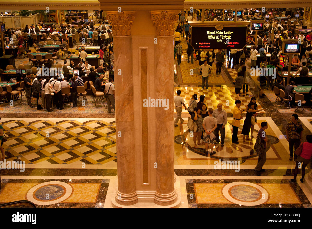 People gambling in the Venetian Casino, Venetian Casino and Hotel Cotai Complex, Strip Macau SAR China Stock Photo