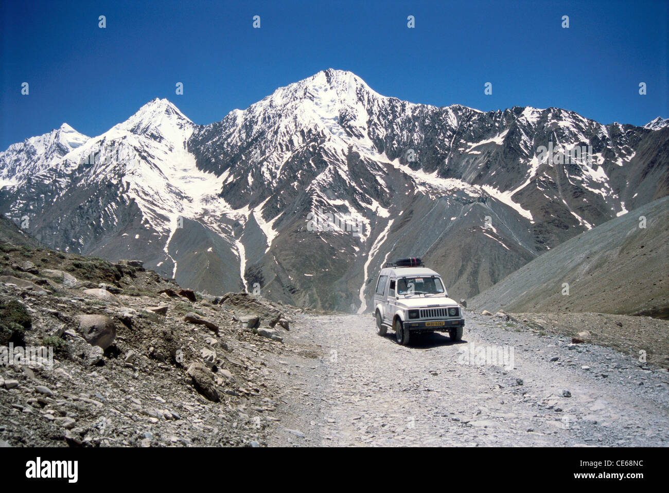 Vehicle on Kunzum La Road ; Lahaul ; Himachal Pradesh ; India Stock Photo