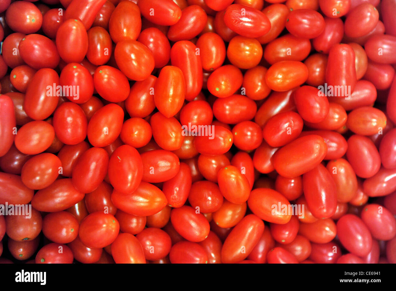 Close up view of 'coeur de pigeon' tomatoes on display in a supermarket. Stock Photo