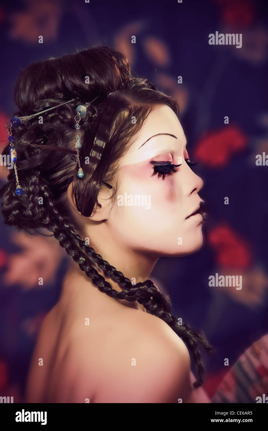 stylized picture of a Japanese geisha, make-up done by professional Polish artist Stock Photo