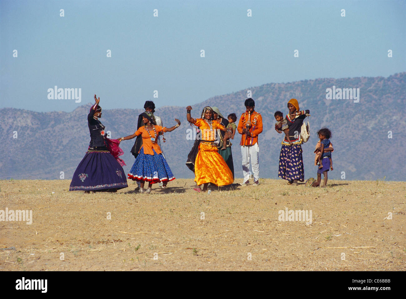 Rural women dancing ; Kalbelia tribe ; Kabeliya Rajasthani tribal folk dance ; Pushkar Fair ; Rajasthan ; India ; asia Stock Photo