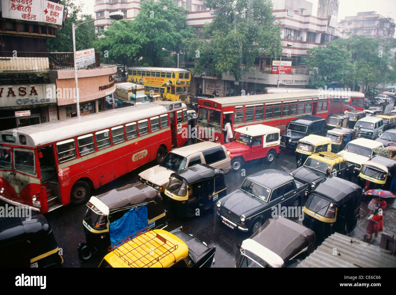 Traffic in monsoon rain cars autos taxies buses ; bombay ; mumbai ; maharashtra ; india ; asia Stock Photo