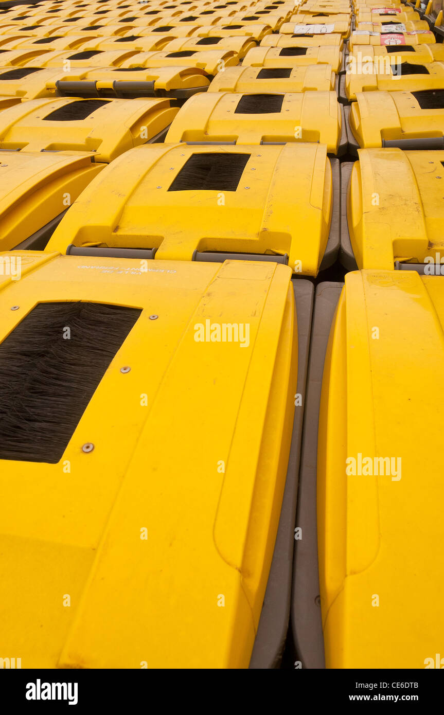 Many plastic recycling refuse bins in rows Stock Photo - Alamy