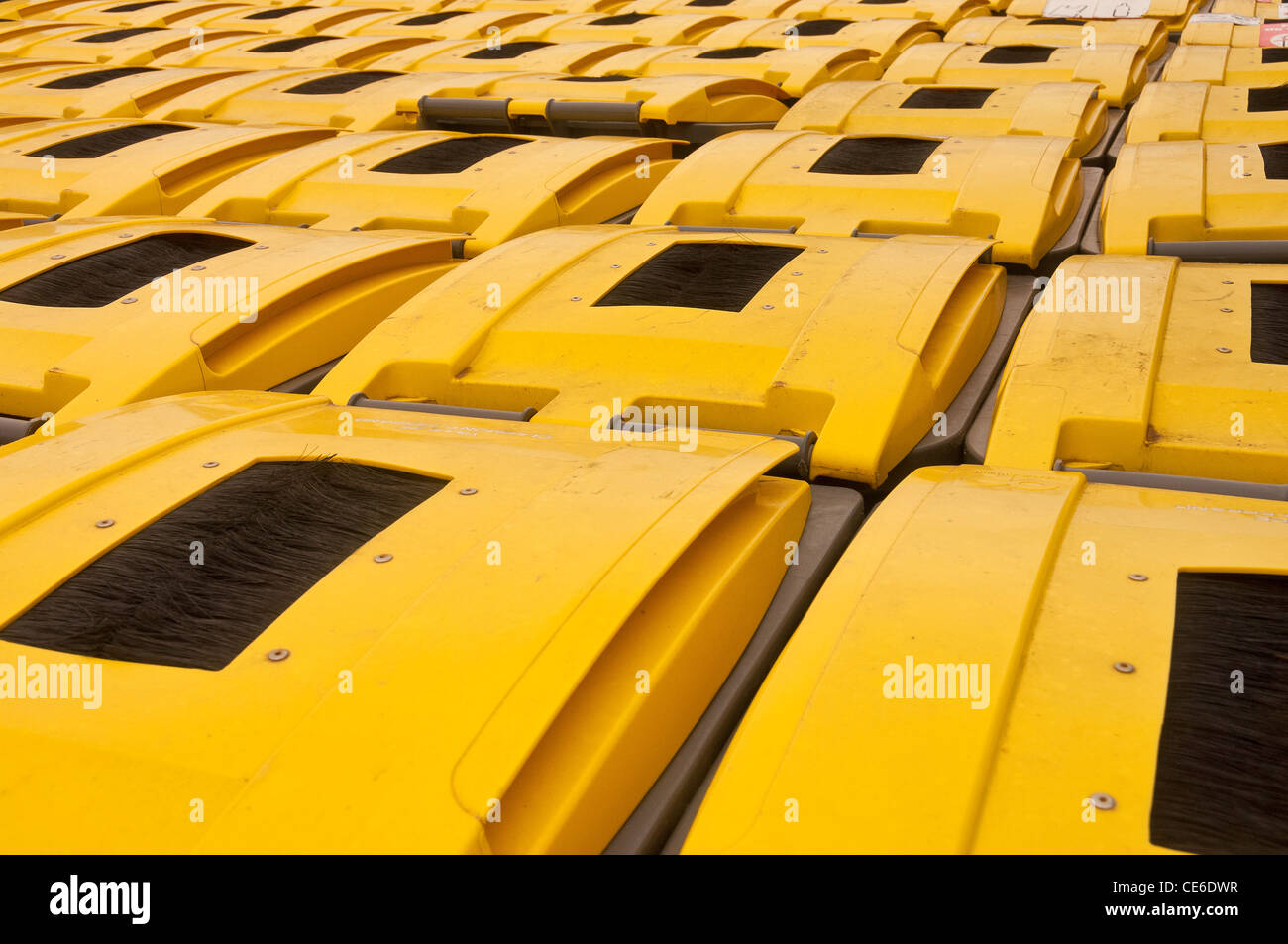 Many plastic recycling refuse bins in rows Stock Photo - Alamy