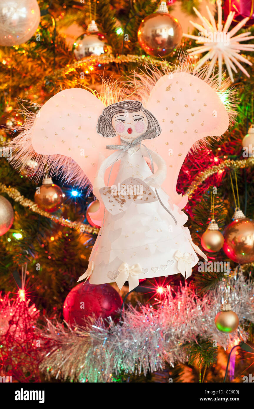 hand made angels on christmas tree Stock Photo Alamy