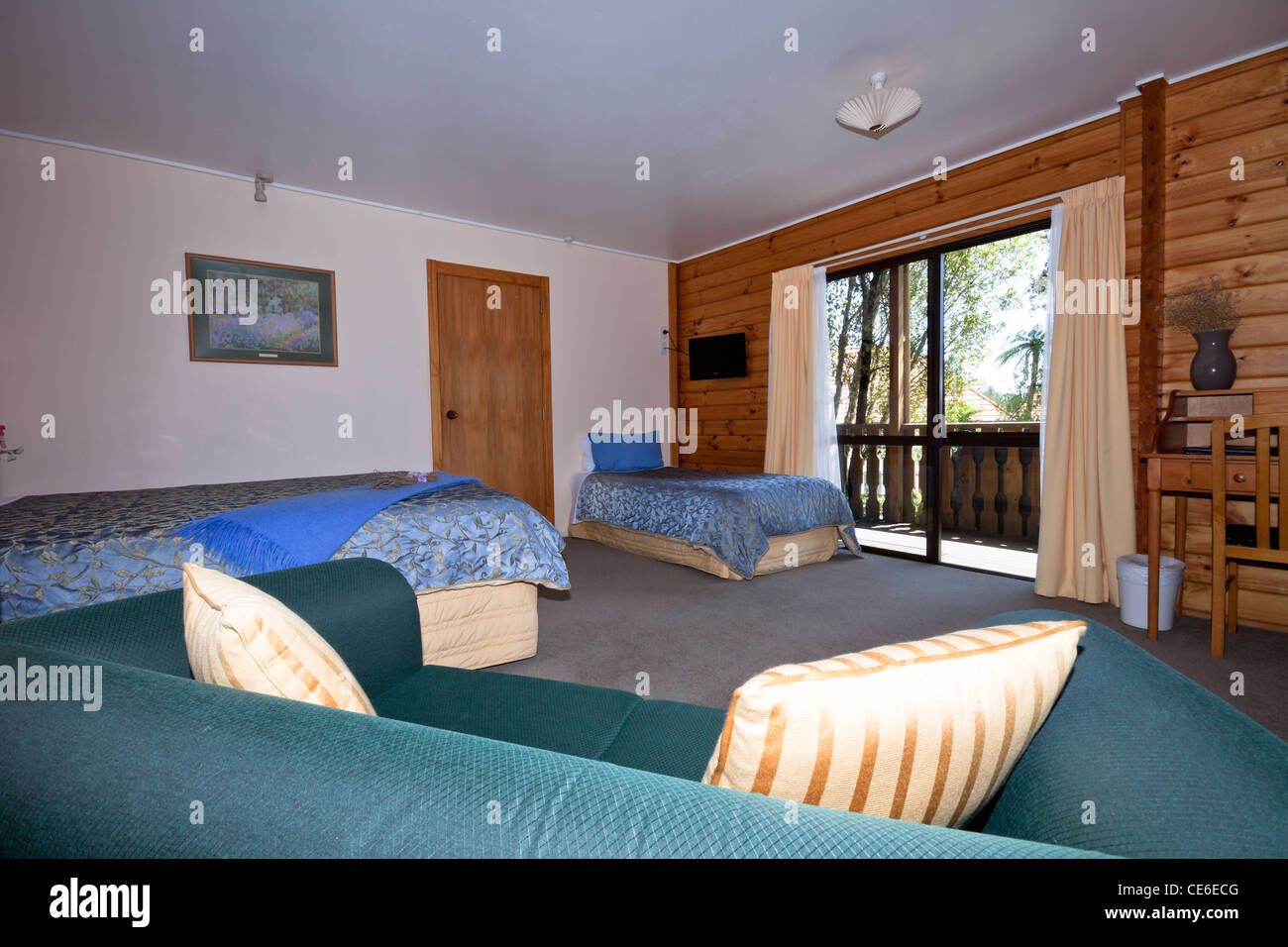 Nice warm interior of mountain wooden lodge apartment. Fox Glacier