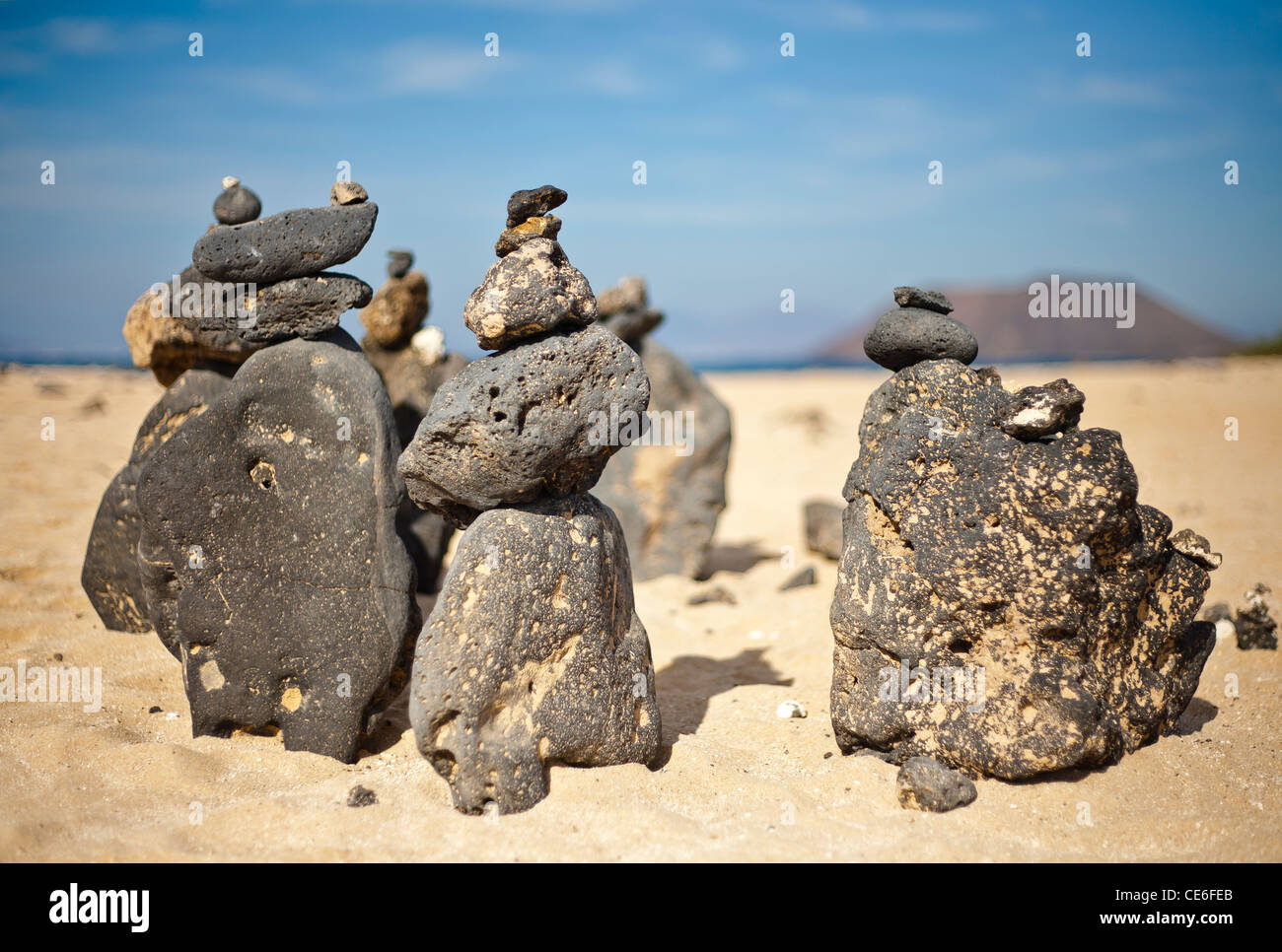 Stone piles on the Corralejo dunes beach Stock Photo