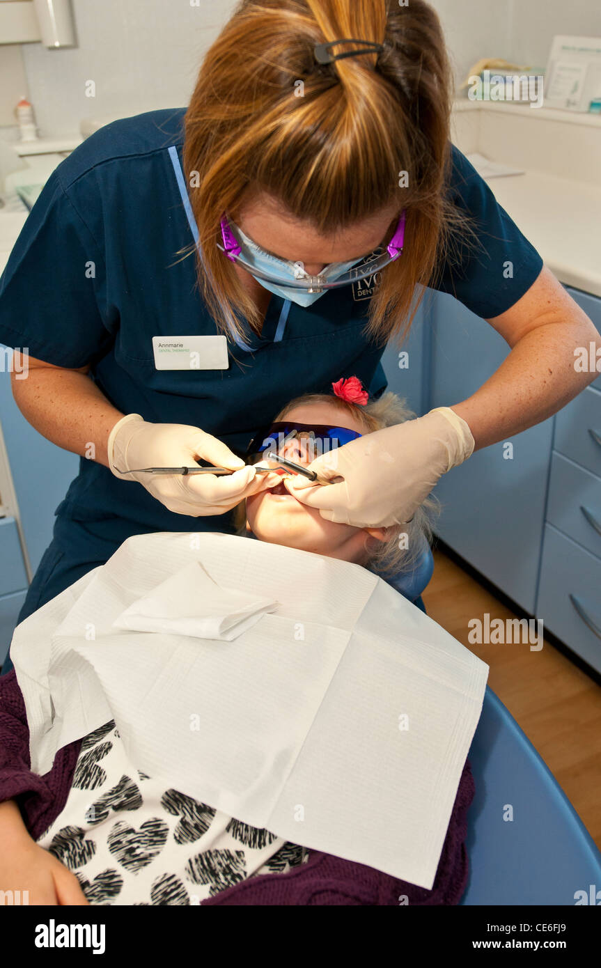 dental hygenist cleaning teeth chair dentist clean hygene checking