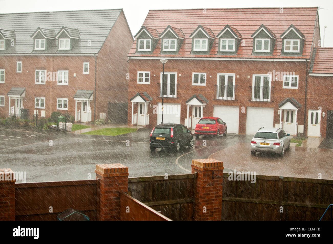 torrential rain on urban housing estate,blackpool,england,uk,europe Stock Photo
