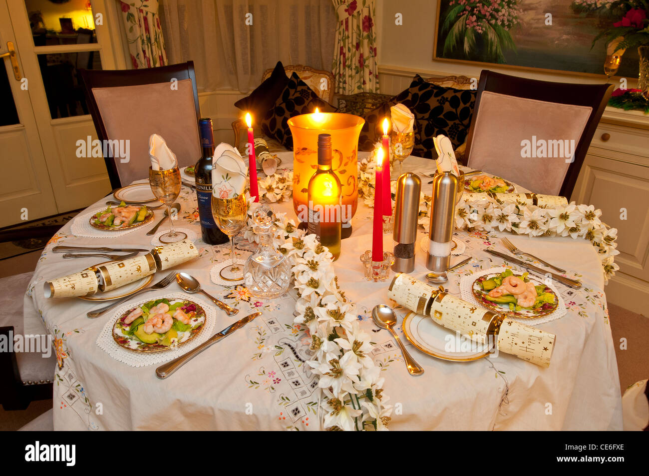 christmas dinner table setting at night Stock Photo