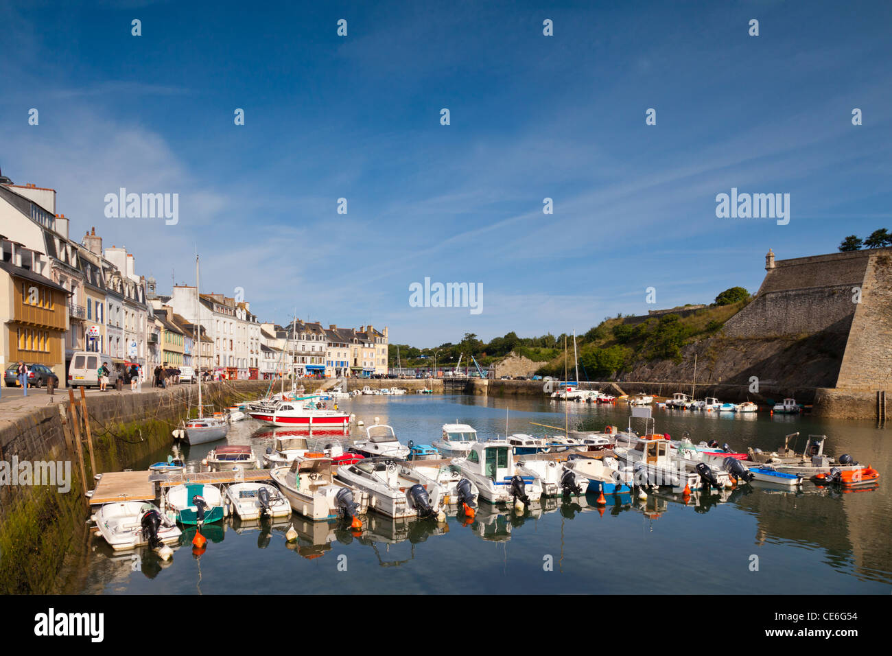Boats in the harbour at le Palais on Belle-Ile, Brittany, opposite the Vauban Citadel. Stock Photo