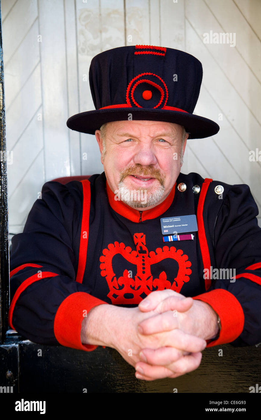 A 'Beefeater' in an information type booth at the Tower of London, in London. UK. Stock Photo