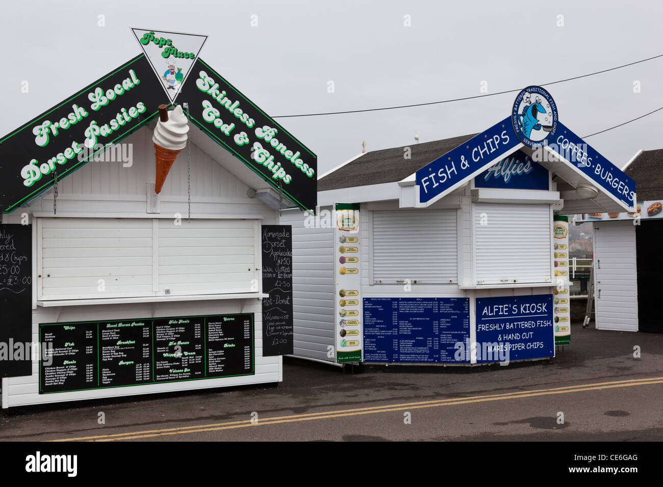 Closed and deserted food stalls during winter in West Bay, Dorset, England. Stock Photo