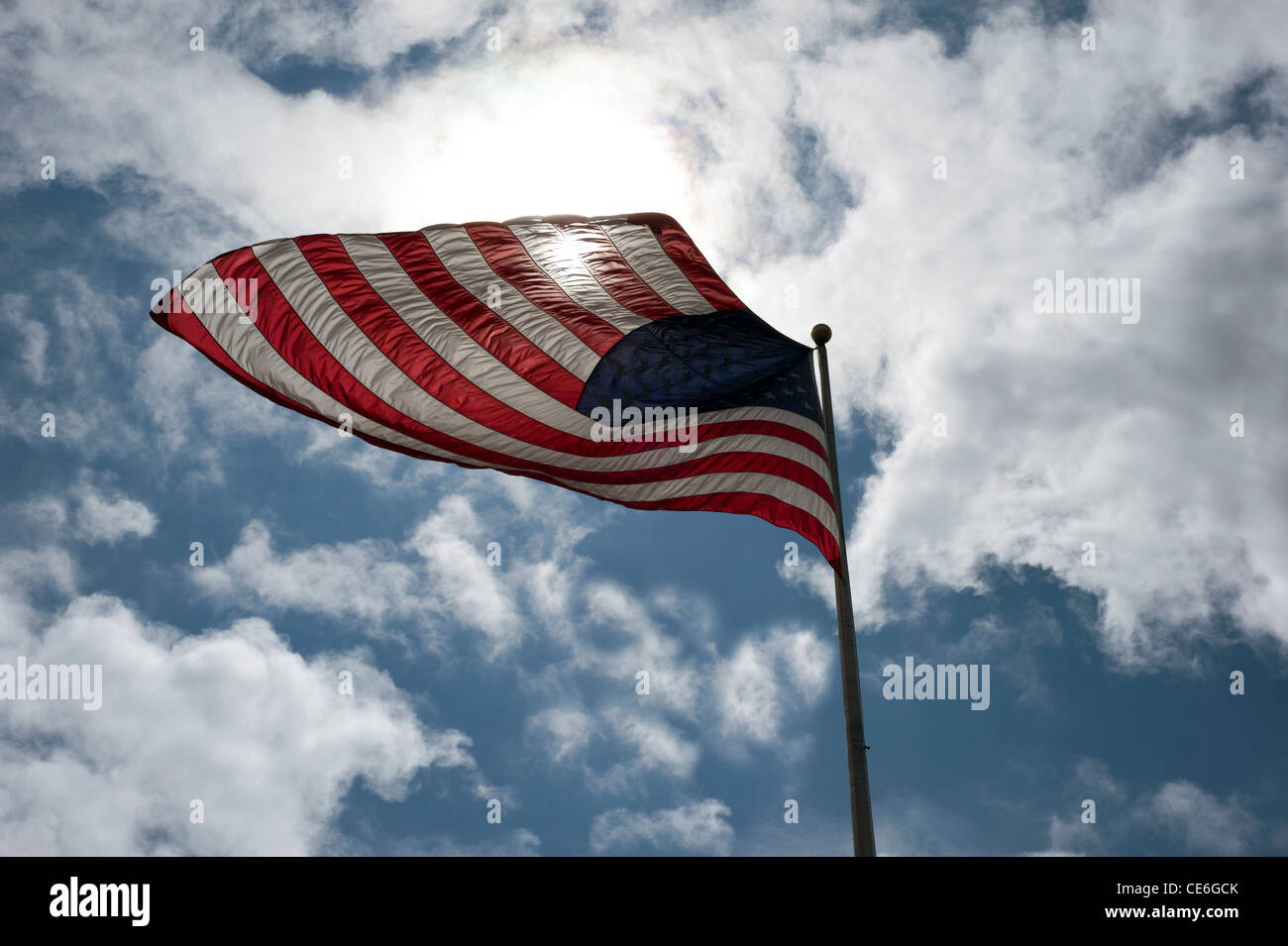 American Flag in strong wind Stock Photo