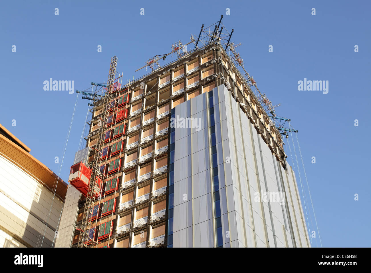 High rise building being refurbished, UK Stock Photo - Alamy - Renovating A High Rise Building