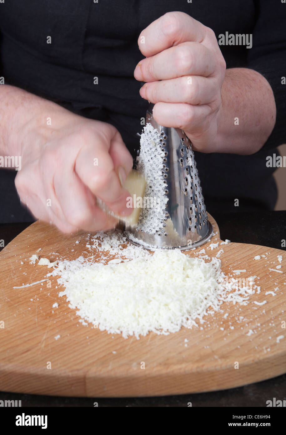 Grating Cheese Stock Photo Alamy