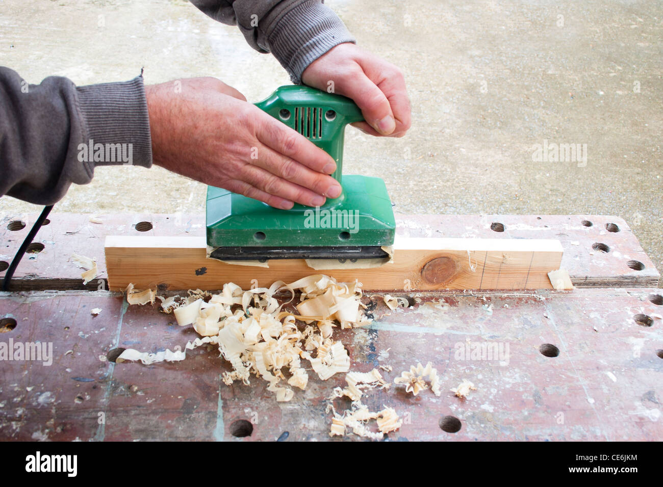 carpenter power sanding wood Stock Photo Alamy