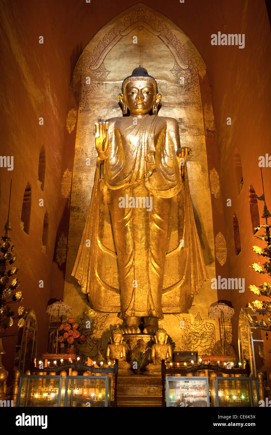 Gilt Buddha at Ananda Temple one of the best preserved of the Bagan temples. Stock Photo