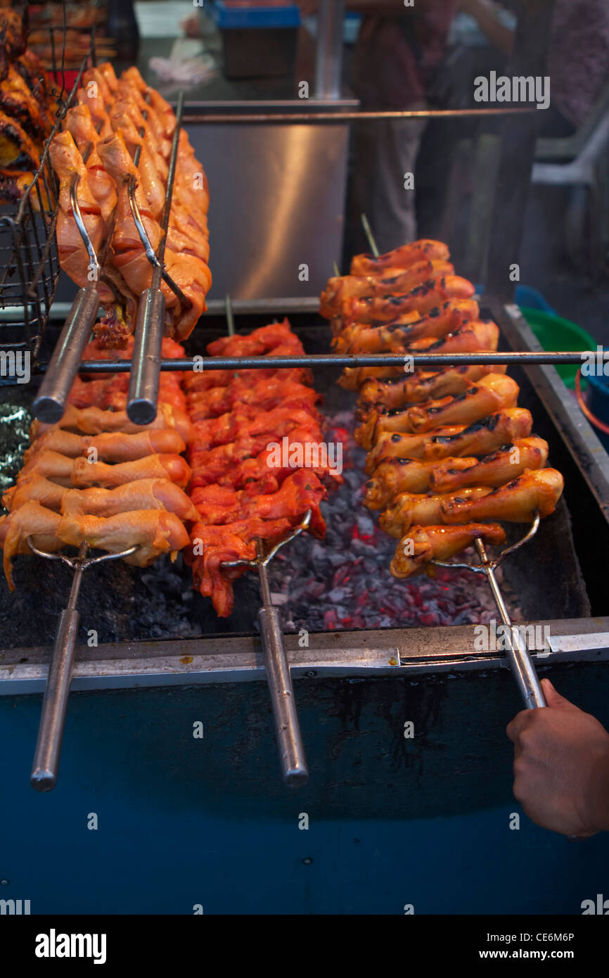 barbecue chicken at the pasar tamu dbku night market, Kuching Stock Photo