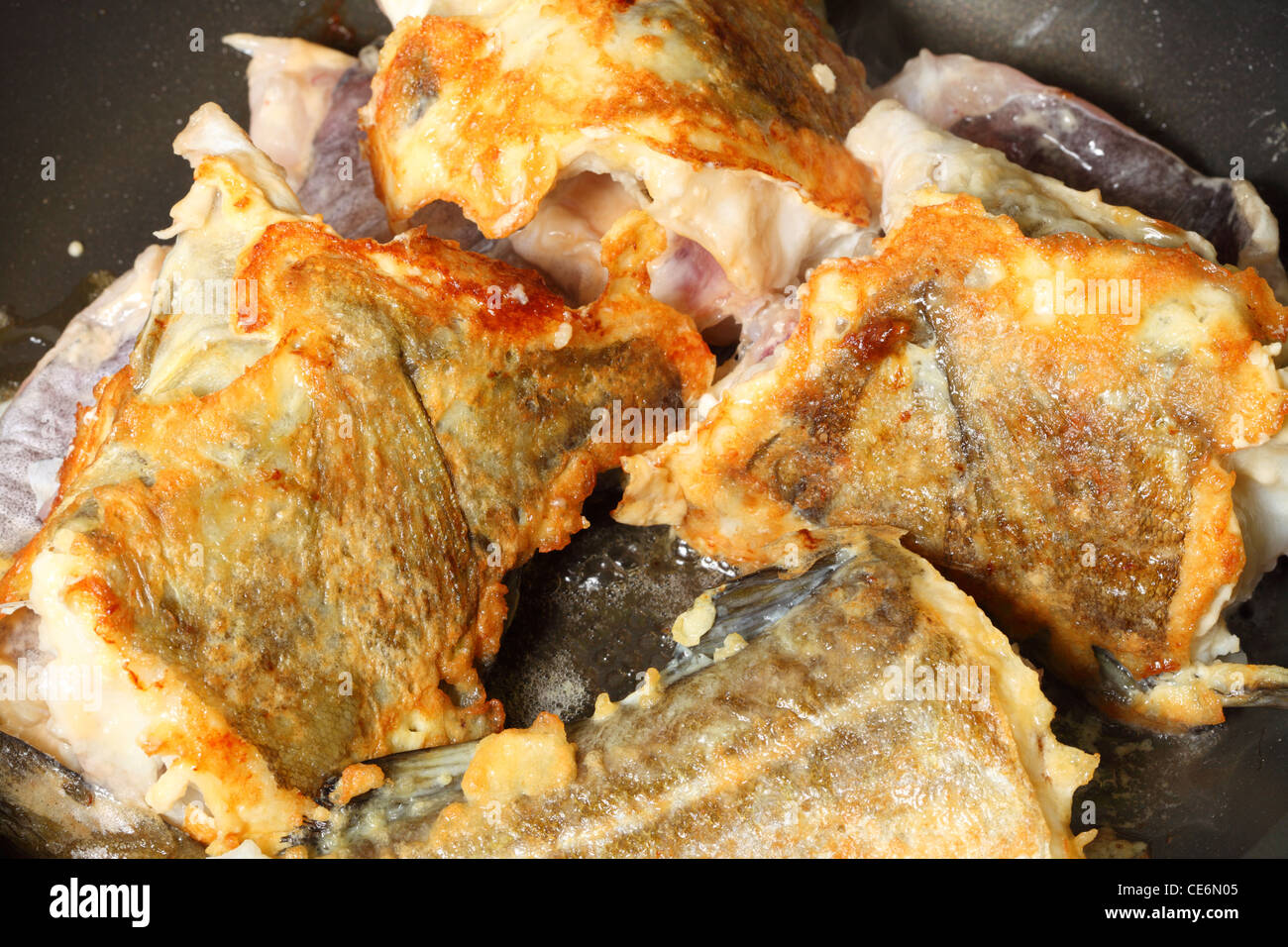 to panfry sth Raw cod fish fillets in kitchen Stock Photo Alamy