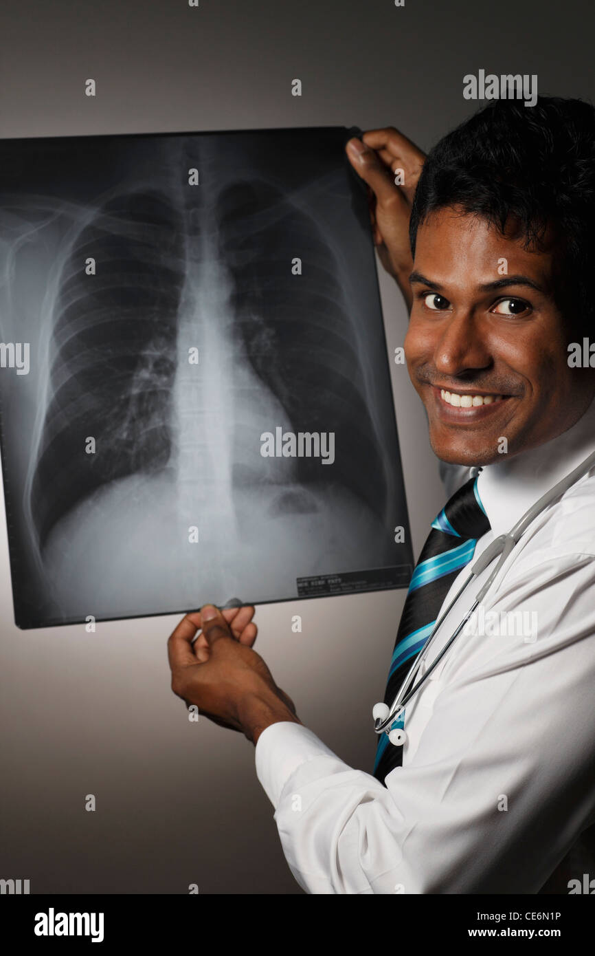 Indian doctor holding x ray hi-res stock photography and images - Alamy
