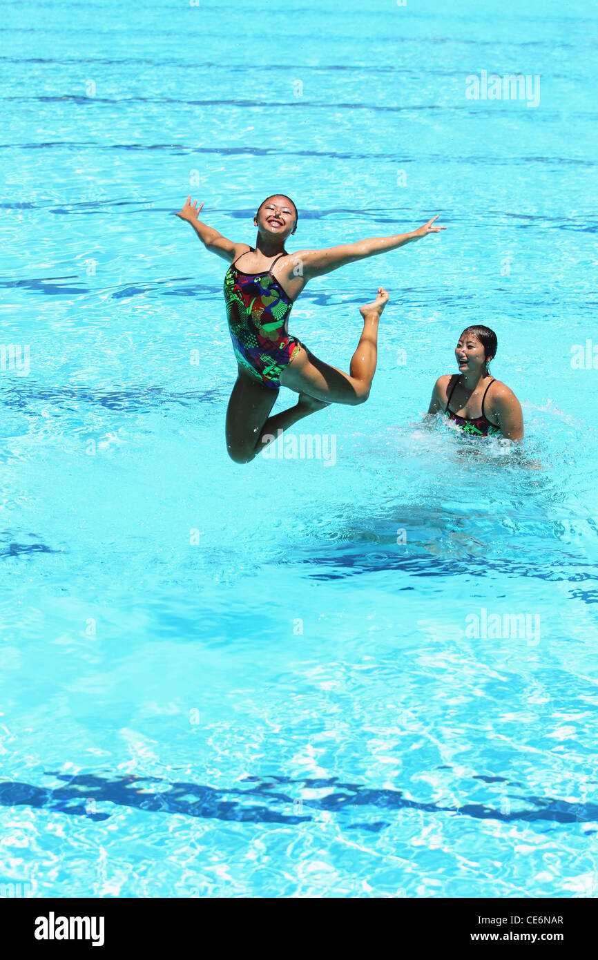 Swimmers Performing, Synchronized Swimming Stock Photo