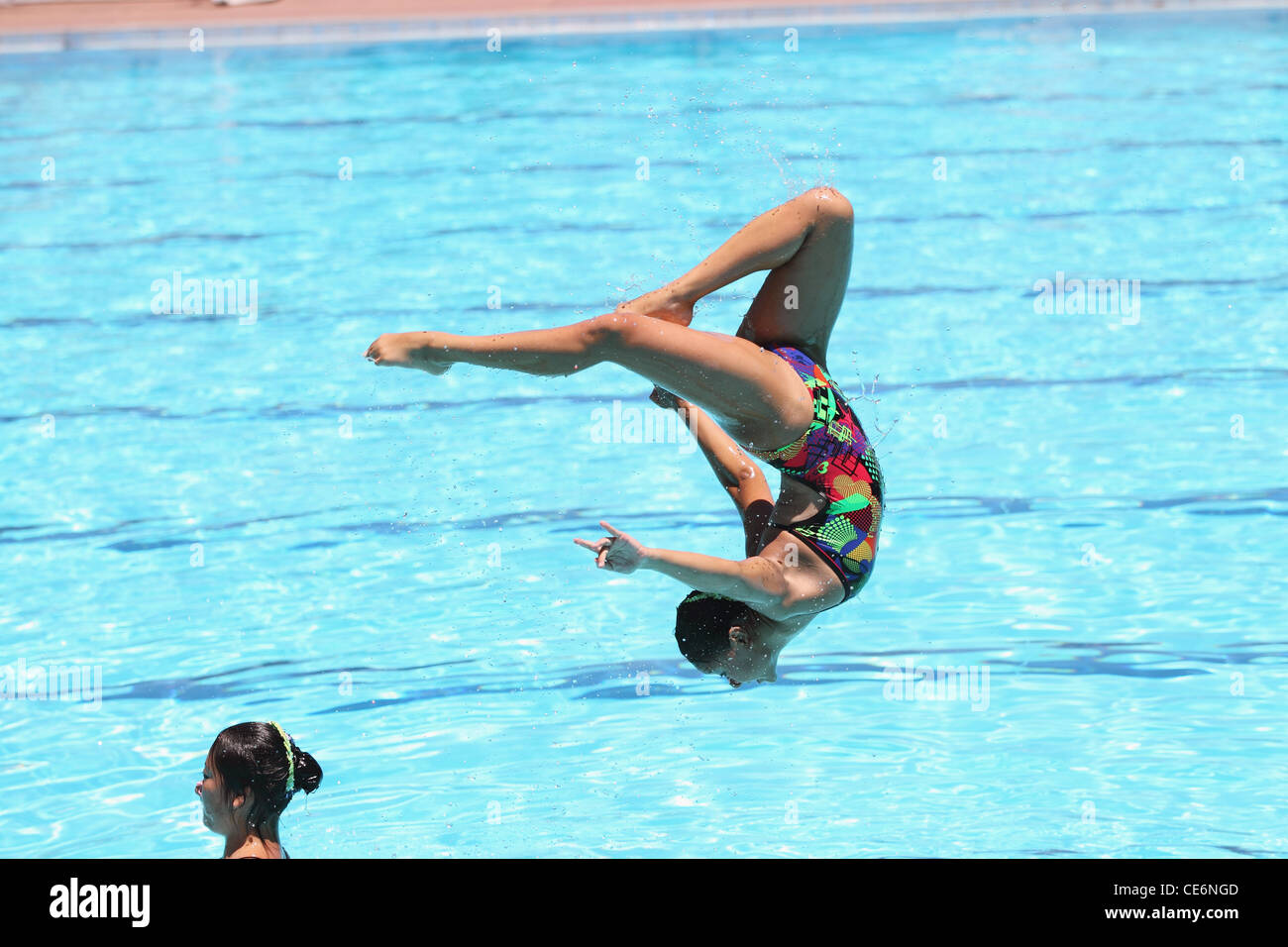 Swimmers Performing, Agility Stock Photo