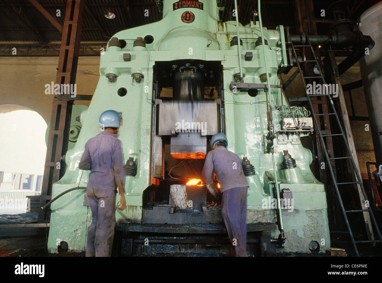 People working in forging factory India Stock Photo