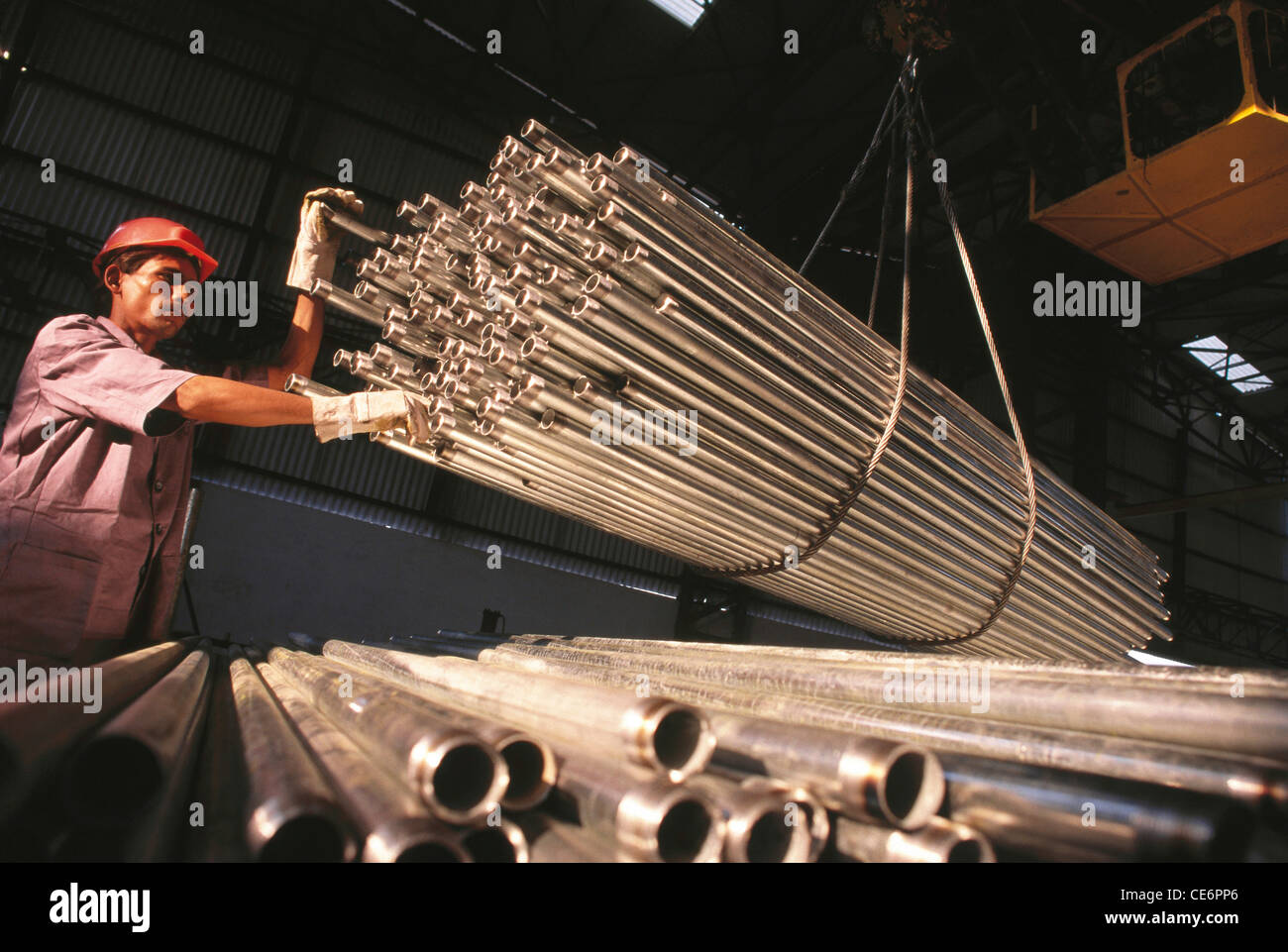 Man working in pipe factory ; india Stock Photo Alamy