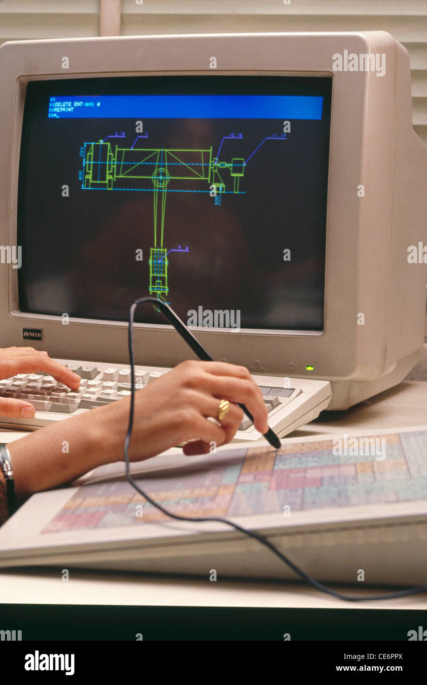 Indian worker using CAD computer aided design ; india ; asia Stock Photo