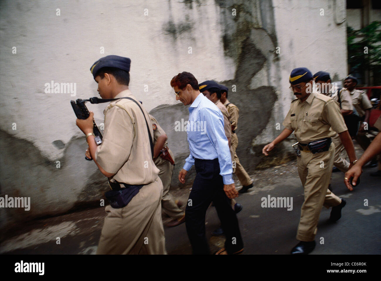 Pappu Kalani ; Indian politician from Ulhasnagar ;  surrounded by armed police men for security ; Bombay ; Mumbai ; Maharashtra ; India; Asia Stock Photo