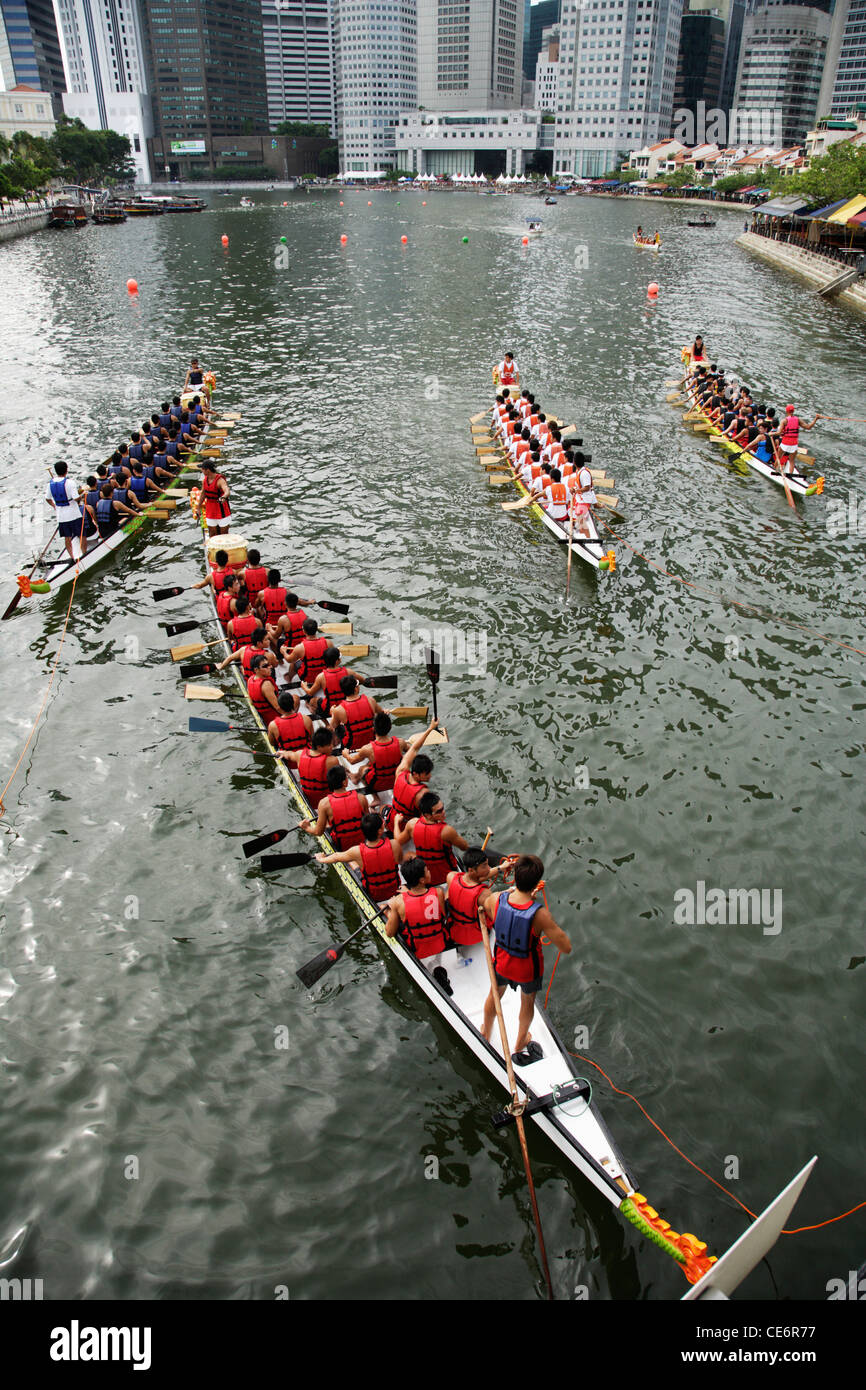 Dragon boats floating down boat quay hi-res stock photography and ...