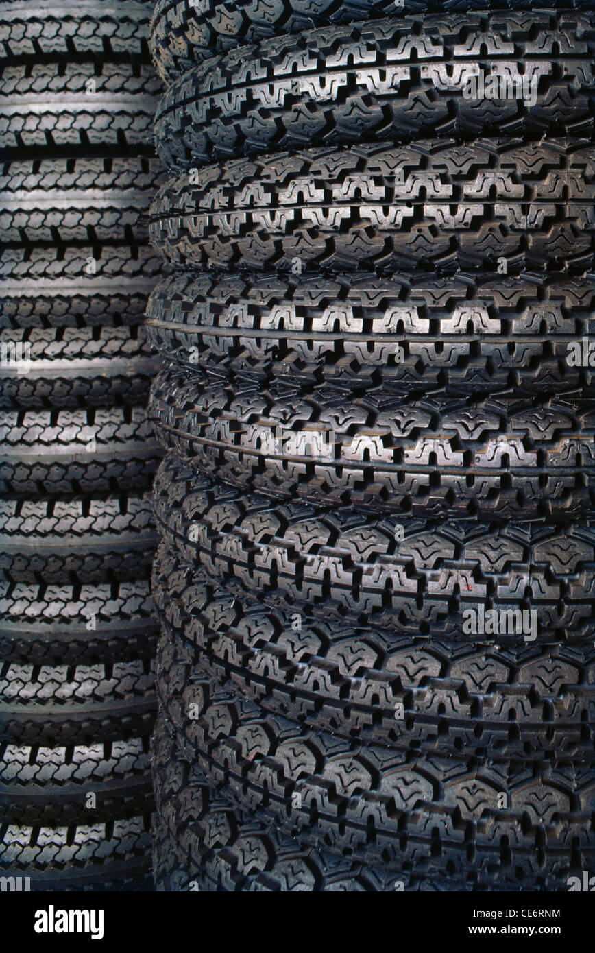 Tyre industry tyres stack stacked in godown india Stock Photo