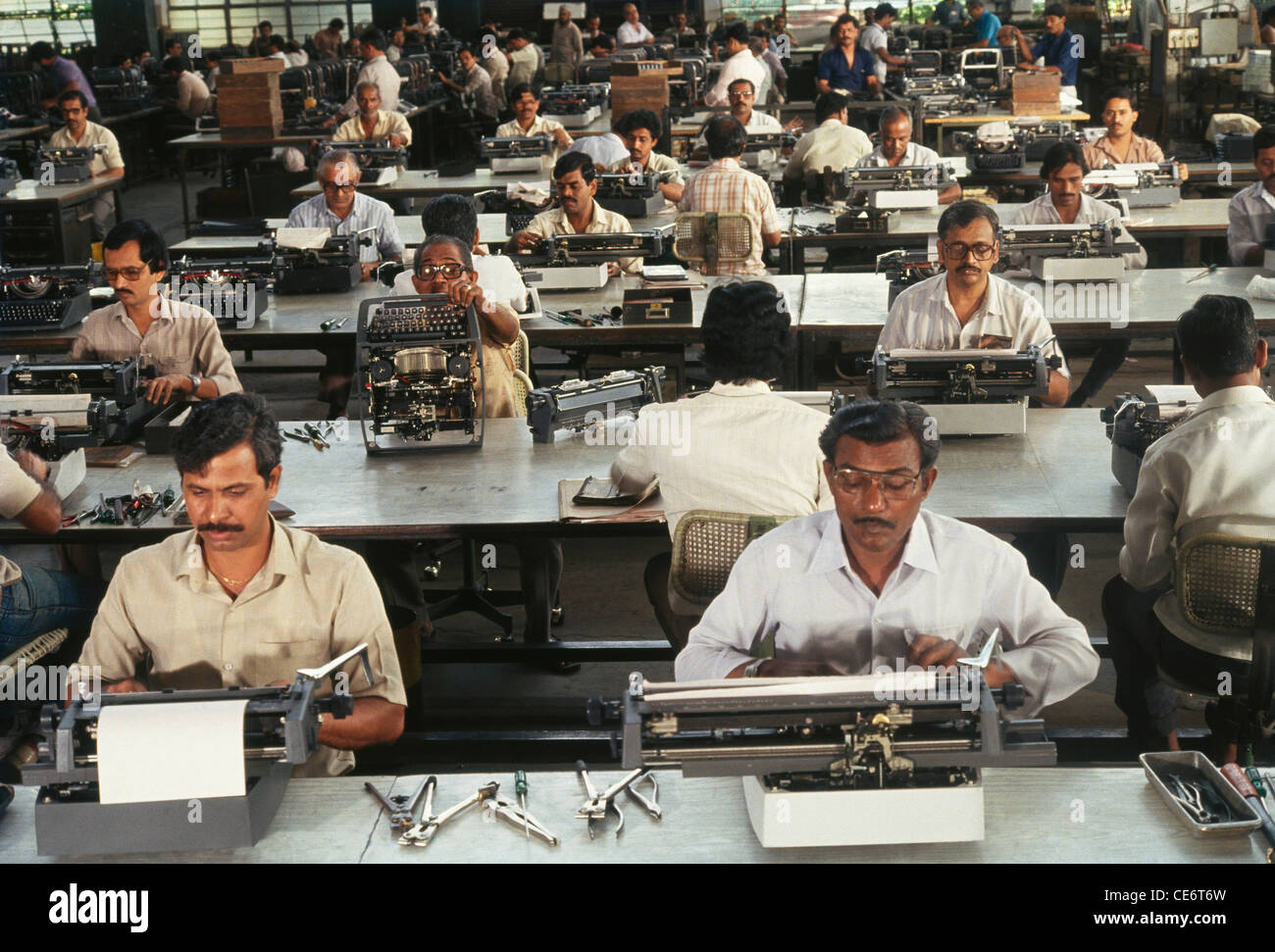 typewriter making testing quality control in factory ; india ; asia