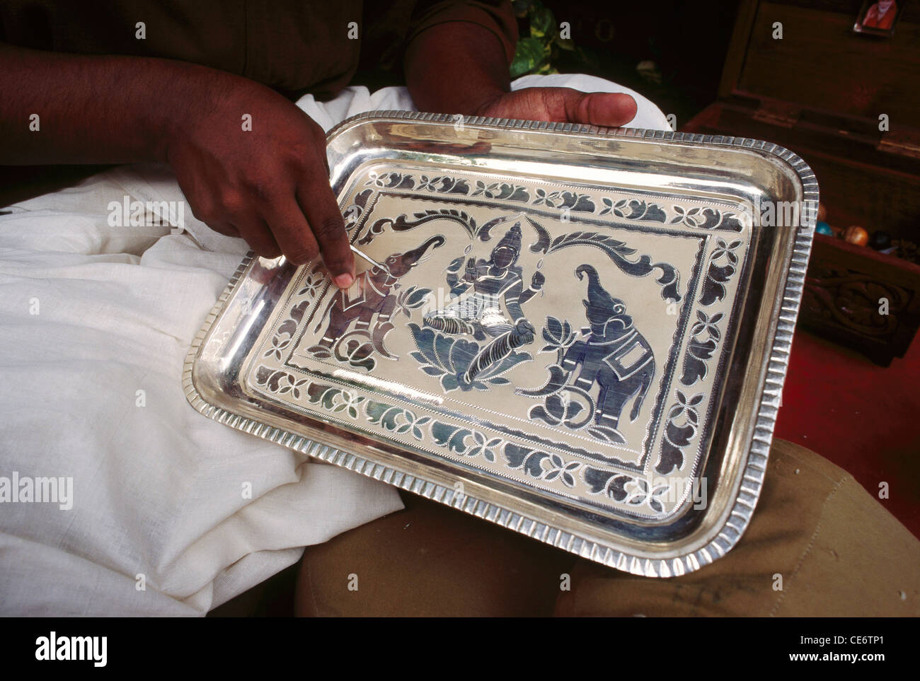 MAA 85112 man engraving goddess lakshmi on silver tray tamil nadu