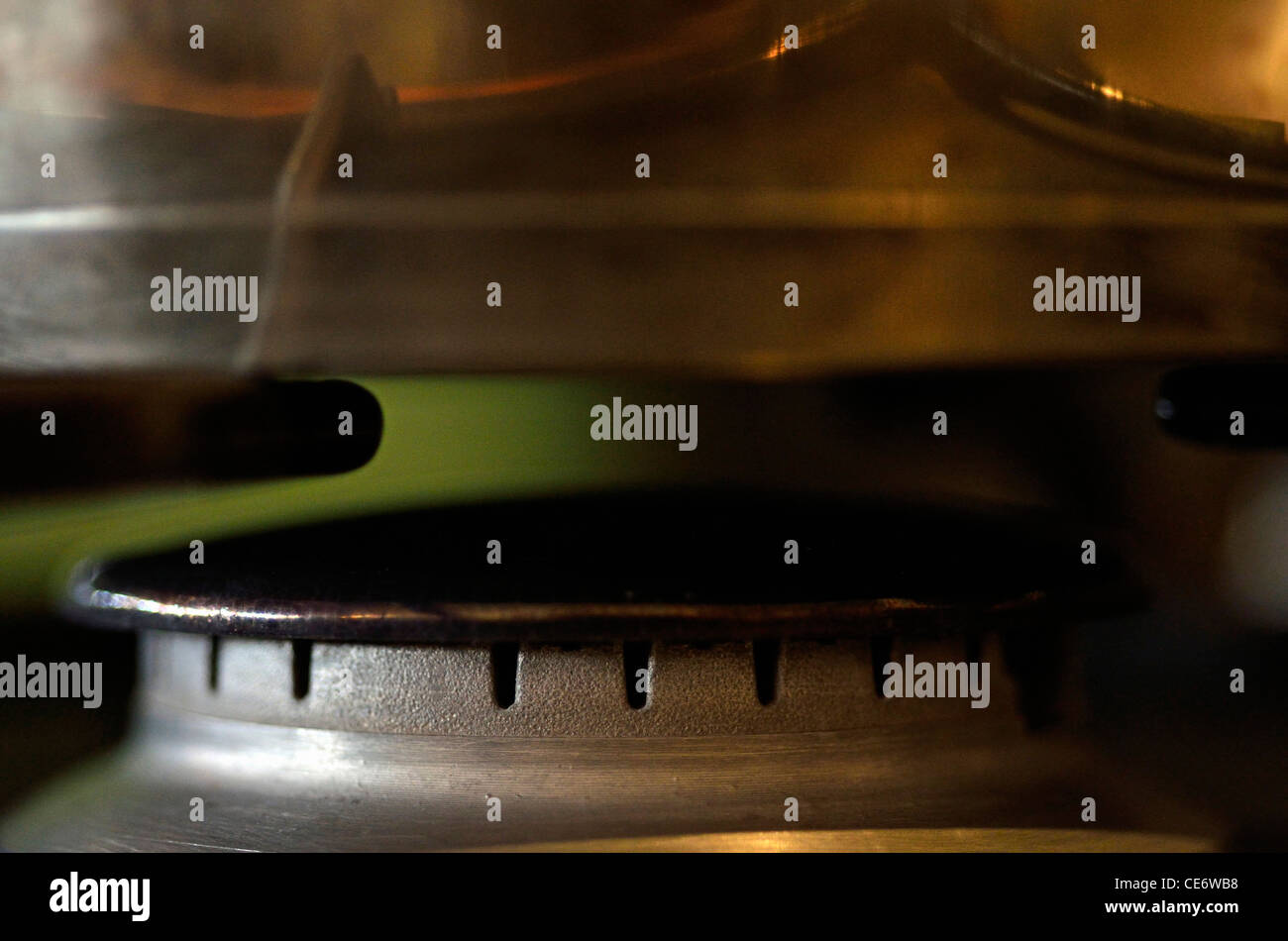 Pan on gas stove burner, close up Stock Photo Alamy