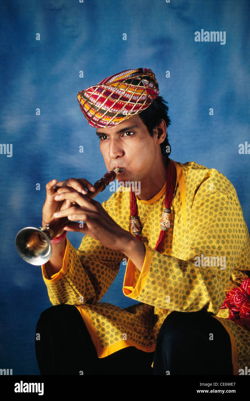 Indian rajasthani folk musician playing wind musical instrument shehnai rajasthan india asia MR#657A Stock Photo