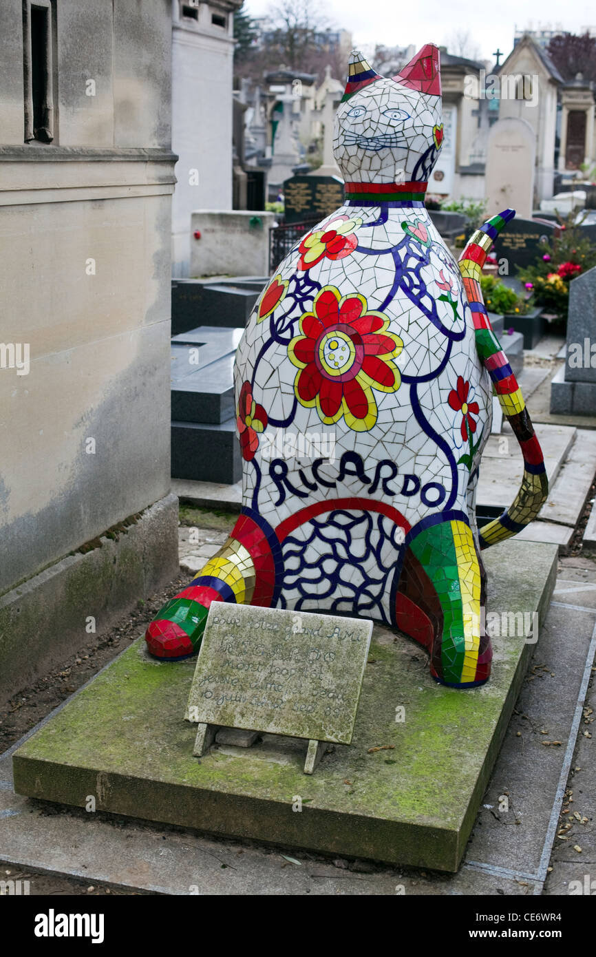 Grave of Ricardo Menon, assistant of artist Niki de Saint Phalle, Montparnasse Cemetery, Paris Stock Photo